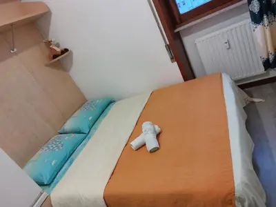 Letto o letti in una camera di #Punto FM 2#