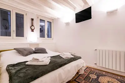 Letto o letti in una camera di San Samuele Venezia Centro+ Wellness Pool Jacuzzi
