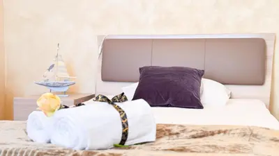 Letto o letti in una camera di Lady Teresa 2.0 by Ca-Sa Check
