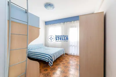 Letto o letti in una camera di Casa Tomè