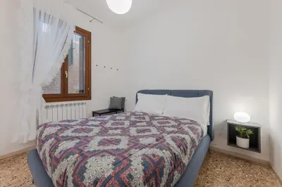 Letto o letti in una camera di Corte sconta