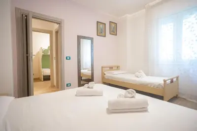 Letto o letti in una camera di Casa Faro 29