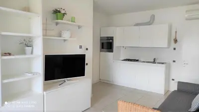Cucina o angolo cottura di LAGUNA PARK VERDE 2 camere Piazza Brescia