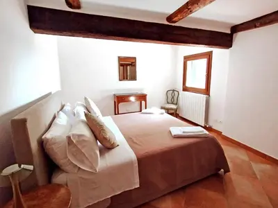 Letto o letti in una camera di A Room with a View Apartment