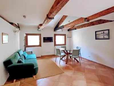 TV o dispositivi per l'intrattenimento presso A Room with a View Apartment