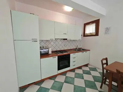 Cucina o angolo cottura di Holiday Homes in Rosolina Mare 48310