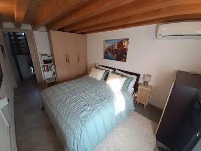 Letto o letti in una camera di Piccola Venezia