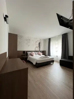 Letto o letti in una camera di Green House