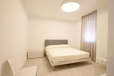 Letto o letti in una camera di Cigno Bianco - Home Immobiliare