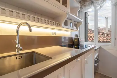 Cucina o angolo cottura di San Marco Suite by Bricola Apartments