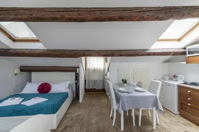 Letto o letti in una camera di Nice Lovely Attic for 4 person with Wifi - A/C