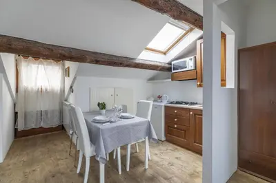 Cucina o angolo cottura di Nice Lovely Attic for 4 person with Wifi - A/C