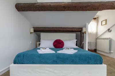Letto o letti in una camera di Nice Lovely Attic for 4 person with Wifi - A/C