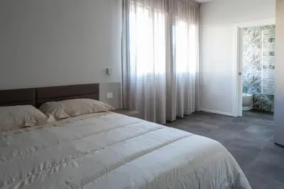 Letto o letti in una camera di Suite Dall'Alba al Tramonto