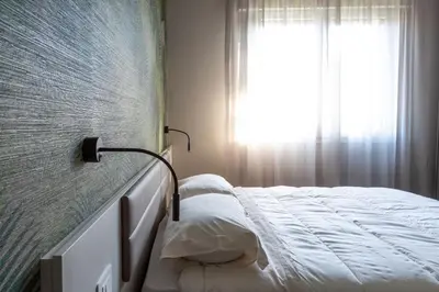 Letto o letti in una camera di Suite Dall'Alba al Tramonto