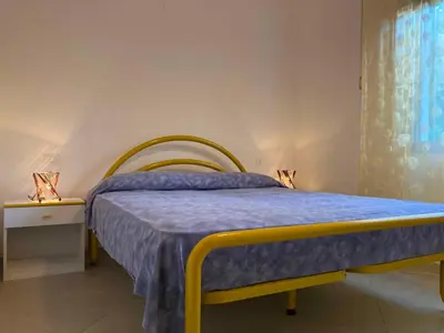 Letto o letti in una camera di Apartment in Rosolina Mare 49215