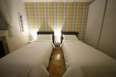 Letto o letti in una camera di Venezia House