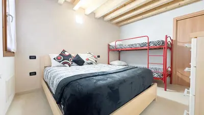 Letto o letti in una camera di Romantic Flower by Ca-Sa Check