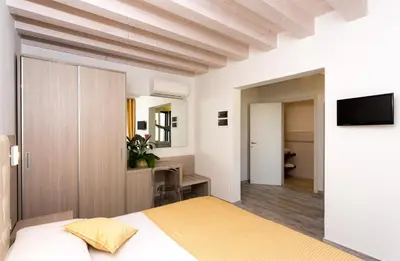 Letto o letti in una camera di Locanda Stravedo