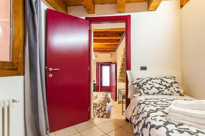 Letto o letti in una camera di CASA MARGHERITA Basilica view & Terrace