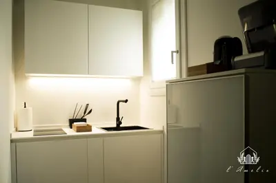 Cucina o angolo cottura di L'AmElie - Elegante Suite