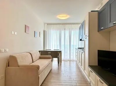 TV o dispositivi per l'intrattenimento presso Villa Emy Fronte Mare - Carraro Immobiliare - Family Apartments