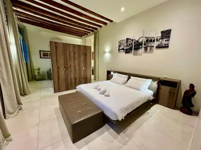 Letto o letti in una camera di Suite Madoneta