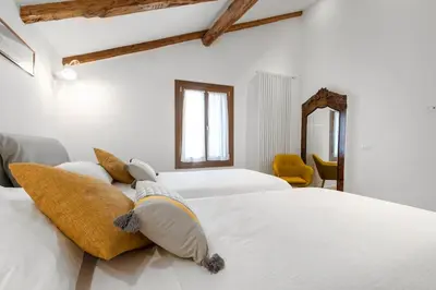 Letto o letti in una camera di Casa CaLi con Altana