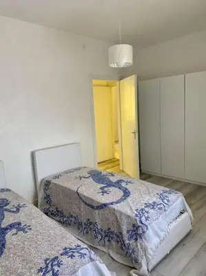 Letto o letti in una camera di Appartamento vista mare Pioppi