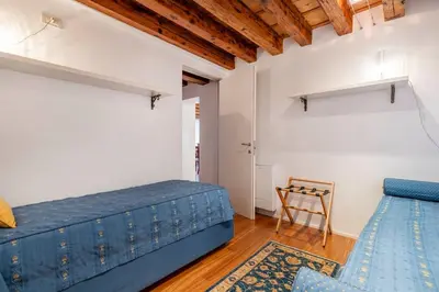 Letto o letti in una camera di Ca’ Bruna San Trovaso Apartment