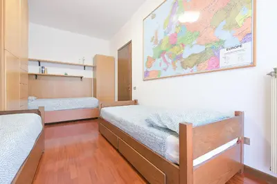 Letto o letti in una camera di Queen Home Paola