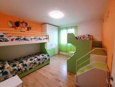 Letto o letti in una camera di New Bedrooms Mamma Gigetta