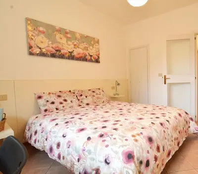 Letto o letti in una camera di Casa della Magnolia - In pieno Centro Storico