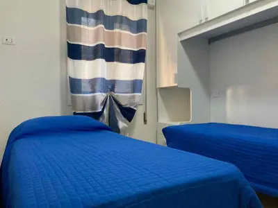 Letto o letti in una camera di Apartment in Rosolina Mare 49216
