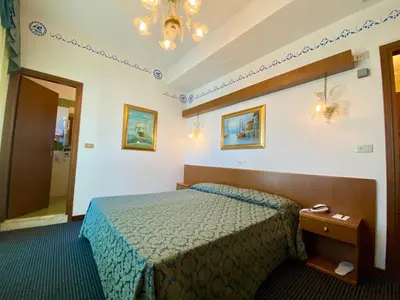 Letto o letti in una camera di Hotel Florida