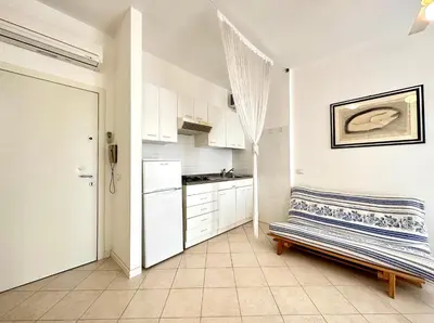 Cucina o angolo cottura di DB Residence con Piscina - Carraro Immobiliare - Family Apartments