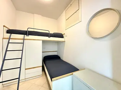 Letto o letti a castello in una camera di DB Residence con Piscina - Carraro Immobiliare - Family Apartments