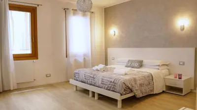 Letto o letti in una camera di TheGlassHouse