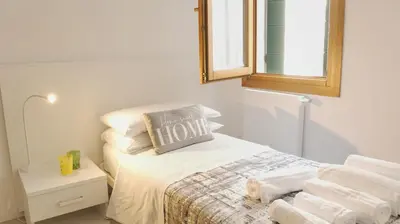 Letto o letti in una camera di TheGlassHouse