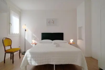 Letto o letti in una camera di Apartment with court center Venice Historical Center