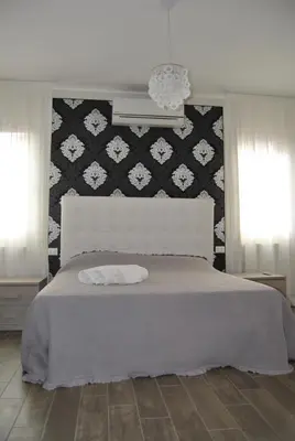Letto o letti in una camera di Ca Ballarin B&B