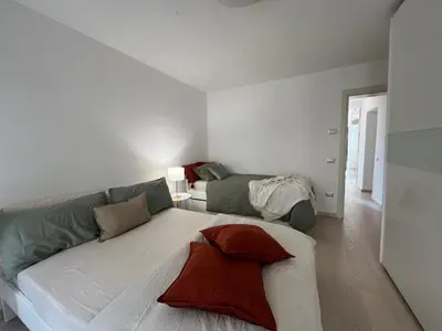 Letto o letti in una camera di Ca' Del Vecio, in centro storico, Piazza Garibaldi