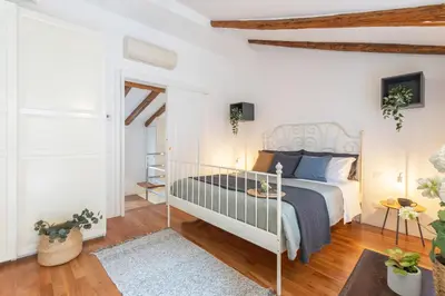 Letto o letti in una camera di La Casa Più Centrale A Venezia, Con Corte Privata