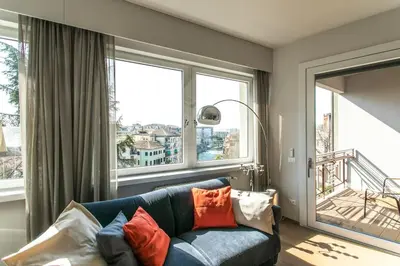 Area soggiorno di Riviera Views Apartment by Welc(H)ome