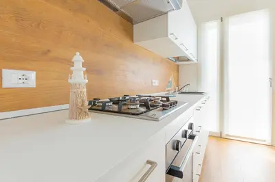 Cucina o angolo cottura di APPARTAMENTI CAVALLINO-TREPORTI