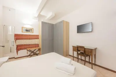 Letto o letti in una camera di Casa Luna - 10 min from Venice Train Station