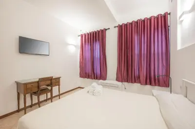 Letto o letti in una camera di Casa Luna - 10 min from Venice Train Station