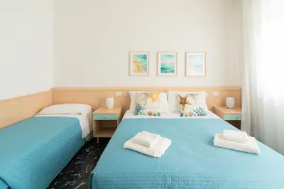 Letto o letti in una camera di Residence Rex