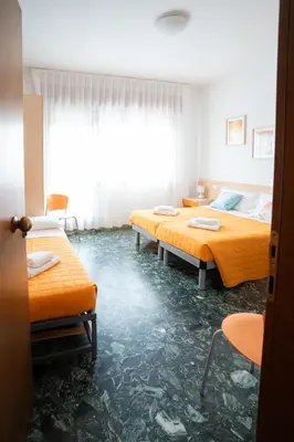 Letto o letti in una camera di Residence Rex