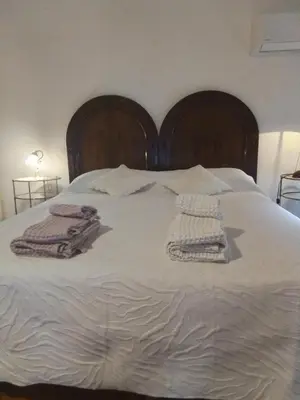 Letto o letti in una camera di La terrazza di Villa Edera